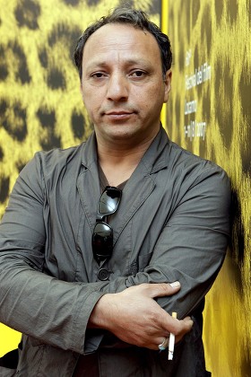 Morocco Born Film Director Hiner Saleem Poses During a Photocall Prior to the Presentation of His Film 'Sous Les Toits De Paris' (beneath the Roofs of Paris) at the 60th International Film Festival Locarno 09 August 2007 in Locarno Switzerland Switzerland Schweiz Suisse Locarno