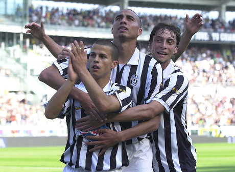 Juventus' forward Sebastian Giovinco celebrates after scoring