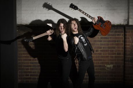 Joel and Ryan O' Keeffe from Australian rock band Airbourne pose at Gibson Guitars showroom in London, Britain - 28 Nov 2008