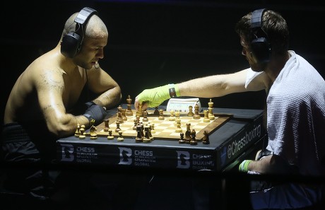 Chessboxing, boxing and chess board game being played alternately