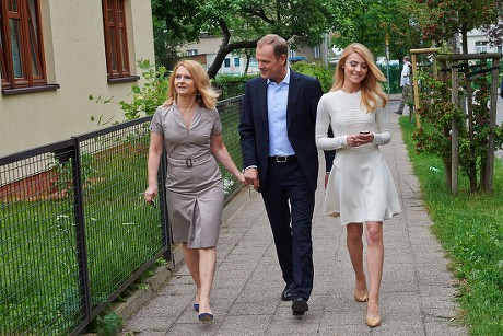 Polish Prime Minister Donald Tusk (c) His Wife Malgorzata Tusk (l) and Their Daughter Katarzyna Tusk (r) Leave After Casting Their Vote For the European Parliament Elections at a Polling Station in Sopot Poland 25 May 2014 the European Elections Will Form a New European Parliament Whose 751 Members Will Help Set Laws in the European Union For Five Years to Come About 400 Million People in the 28-country Bloc Are Eligible to Vote Poland Sopot