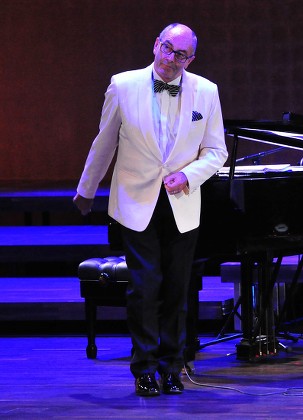 A Picture Made Available on 30 November 2014 Shows Conductor and Pianist Wil Salden of Us Glenn Miller Orchestra on Stage During Their Concert at the Szczecin Philharmonic in Szczecin Poland 29 November 2014 Poland Szczecin