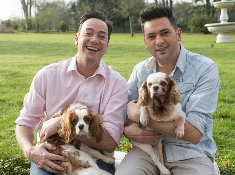 'strictly Come Dancing' Judge Craig Revel Horwood With His Partner Damon Scott And Their Two Dogs Sophie Who Has A Terminal Heart Condition And New Puppy Charlie A Rescue Dog From Battersea Dog Trust..