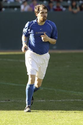 Mia Hamm and Nomar Garciaparra take part in a celebrity soccer