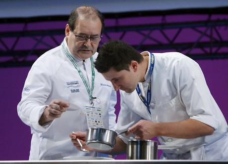 Spanish Cooker Hilario Arbelaitz (l) of Zuberoa of Oiartzun's Restaurant Cooks During the Last Day of the 17th Edition of the San Sebastian Gastronomika Festival Held at Kursaal Congress Palace in San Sebastian Basque Country Spain 07 October 2015 San Sebastian Gastronomika is Focus in the Global Standard For Haute Cuisine and This Year the Guest Cities Are Singapore and Hong Kong the Festival Runs From 04 to 07 October Spain San Sebastian