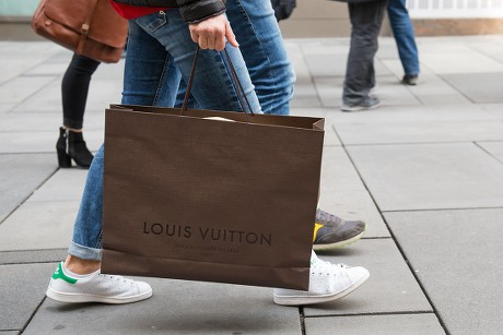 Louis Vuitton Shopping Bag Stock Photos and Images - 123RF