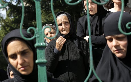 Romanian Orthodox Nuns Look Trough Fence Editorial Stock Photo - Stock ...