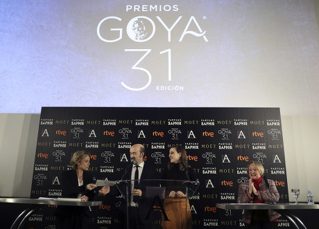 Notary Eva Sanz (l) Hands in the Envelope with Nominees to the 31st Edition of the Film Goya Awards to Spanish Actor Javier Camara (2l) and Actress Natalia De Molina (2r) Before President of the Spanish Academy of Arts and Cinematographic Sciences Yvonne Blake (r) During a Ceremony Held at the Academy's Headquarters in Madrid Spain 14 December 2016 the Favourite Films For the Goya Awards Are 'A Monster Calls' with 12 Nominations of Spanish Director Juan Antonio Bayona; 'The Man with Thousand Faces' of Director Alberto Rodriguez and 'The Fury of a Patient Man' of Raul Arevalo Both of Them with 11 Nominations Spain Madrid