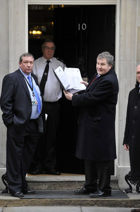 Construction and engineering workers union UNITE deliver a petition to No.10 Downing St calling on Prime Minister Gordon Brown to insist that employers give UK workers fair access to work. London, Britain - 11 Feb 2009