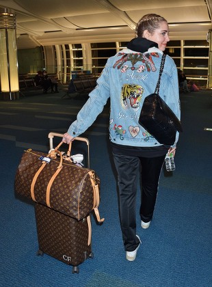 Chiara Ferragni Louis Vuitton travel bag air port style
