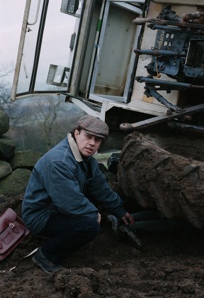 Donna Trapped Underneath Fallen Tractor On Editorial Stock Photo ...