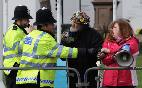 Police officers confront Peace Protesters in London, Britain - 11 Mar 2009