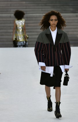 A model displays a creation by designer Nicolas Ghesquiere for