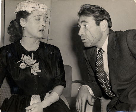 Bette Davis And Fourth Husband Actor Gary Merrill (married August 1950 - Divorced July 1960) At The Savoy Hotel In London For A Press Reception For The Film 'another Man's Poison'. Actress Bette Davis (april 5 1908 - October 6 1989). Gary Merrill 