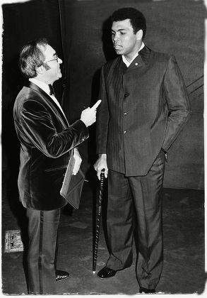 Fleet Street''s Number One Boxing Writer Reg Gutteridge (died January 2009): Makes A Point To Muhammad Ali (formerly Cassius Clay). Ali Had Chaired The Talk-in At The New Victoria Theatre In London. Photo By - Roger Allston...