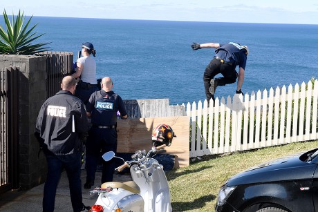 Australian police search a home during an international drug raid, Sydney, Australia - 08 Aug 2017