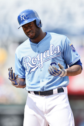 Former Kansas City Royals center fielder Lorenzo Cain reacts