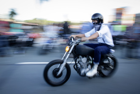 Filipino Motorcycle Enthusiast Rides During Distinguished Editorial ...