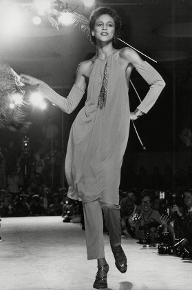 Model Alva Chinn On The Catwalk Wearing Silk Jersey Dress And Pants Suit By Krizia At 1979 Milan Fashion Show. Box 745 507041748 A.jpg.