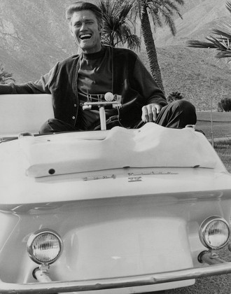 American Actor Chuck Connors On A Golf Cart At Canyon Country Golf Club Palm Springs. Box 757 418051738 A.jpg.