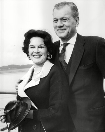 American Actor Joseph Cotten And His Actress Wife Patricia Medina (she Is His 2nd Wife) On Arrival At Southampton. Box 763 408061725 A.jpg.