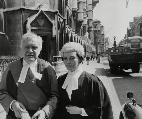 Actor Andrew Cruickshank Who Plays Mr Justice Carstairs And Carol Mauray Who Plays A Barrister In The Play 'alibi For A Judge' At The Savoy Theatre Pictured Outside The Law Courts In The Strand. Box 768 929061727 A.jpg.