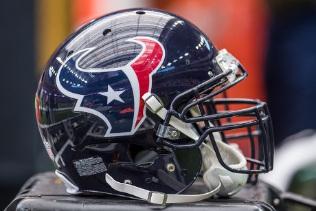 A Houston Texans helmet sits on the sidelines before an NFL