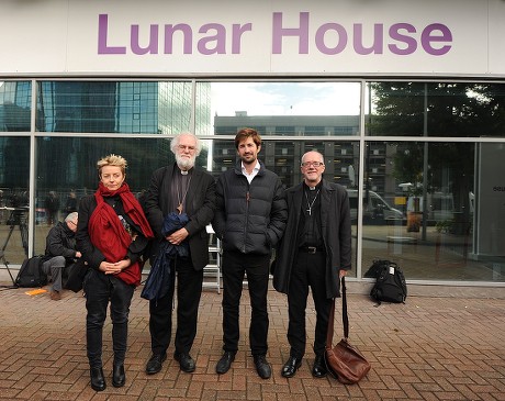 Dr Rowan Williams Former Archbishop Of Canterbury (second From Left) Welcomes The Refugees To Croydon After He Is Brought Over From Calais. Refugee Children From Calais Arrive In Croydon At The Home Office Lunar House To Register Themselves In The Uk