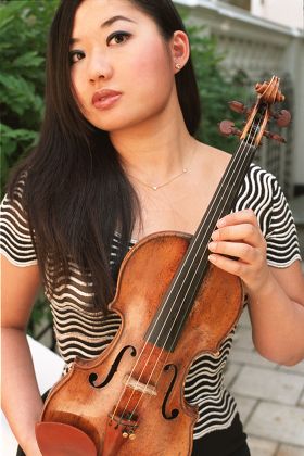 Violinist Sarah Chang Violinist Sarah Chang 20. She Is Currently In London To Play The Dvorak Violin Concerto With The London Philharmonic. She Took Her First Lesson At Four Years Old And Was Performing In Public At Eight And Has Been Described By Ye