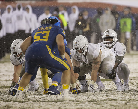 In the middle of pile up, Army quarterback Ahmad Bradshaw breaks the goal  line for the game-winning touchdown of the 118th Army-Navy Game in  Philadelphia Dec. 9, 2017. (DoD photo by EJ