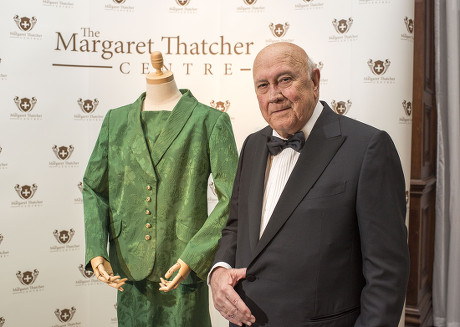 F.w. De Klerk. Former South Africa State President F.w. De Klerk With The Dress That Margaret Thatcher Wore When She Greeted Nelson Mandela Shortly After His Release On The Doorstep Of No 10 Downing Street. With Conservative Mp Conor Burns At The Mar