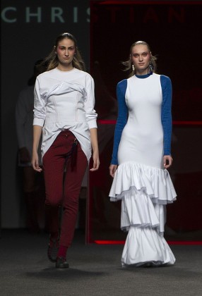 Almudena Canedo and Tanya Reutt on the catwalk
