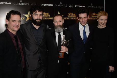 Winners of the Everyman Award for Best Film 'Gods Own Country' - Alec Secareanu, Francis Lee and Josh O'Connor presented by Crispin Lilly (CEO of Everyman) and Lily Cole
