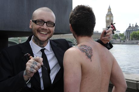 Tattoo in honour of 'Salvador Dali' at the Dali Universe, London, Britain - 04 Jun 2009