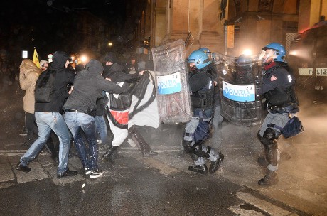 Clashes between the police and social centers in Bologna, Italy - 16 Feb 2018