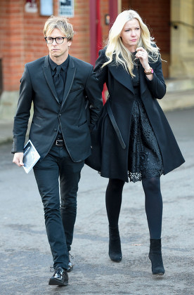 Rick Parfitt Jnr And His Girlfriend.friends And Family Attend Status Quo Guitar Player Rick Parfitt's Funeral Today 19th January 2017. Held At Woking Crematorium.