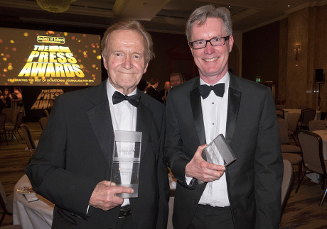 The Press Awards For 2016 Held At The Hilton Park Lane 14 March 2017. Daily Mail Winners Andy Hooper For Sports Photographer Of The Year Stanley Mcmurtry(mac) Cartoonist Of The Year And Peter Oborne Columnist Of The Year.