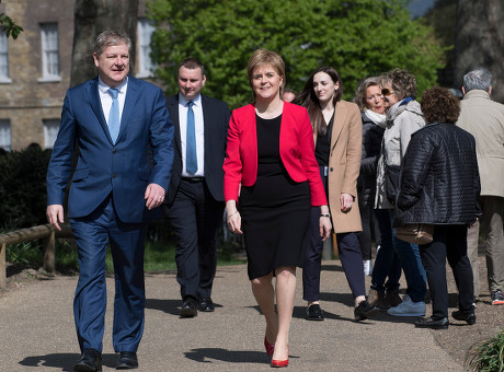 Nicola Sturgeon. Scottish National Party Leader Nicola Sturgeon Arrives At A Press Call With Angus Robertson At Victoria Gardens And Is Joined By The Snp Westminster Group.