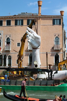Lorenzo Quinn 'Support' art installation is removed, Venice, Italy - 08 May 2018