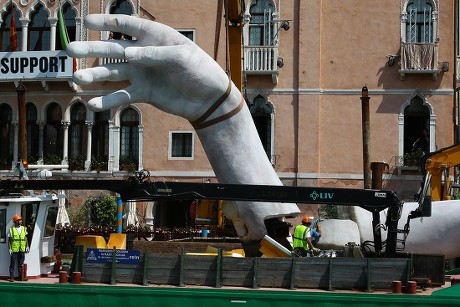 Lorenzo Quinn 'Support' art installation is removed, Venice, Italy - 08 May 2018
