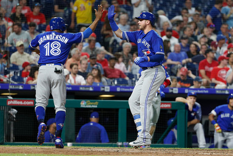 Toronto Blue Jays first baseman Justin Smoak (14) and Toronto Blue