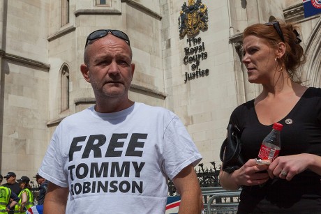 FreeTommy supporters gather outside London's Royal Courts of Justice to show solidarity with far-right activist Tommy Robinson, who's appeal against his recent imprisonment is due to be heard by Lord Justice Leveson. Sir Brian Henry Leveson is currently the President of the Queen's Bench Division and Head of Criminal Justice in the UK.