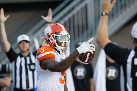 Ottawa, Canada. 20th July, 2018. BC Lions quarterback Cody Fajardo (17)  takes the snap from center Cody Husband (62) during the CFL game between  the BC Lions and Ottawa Redblacks at TD