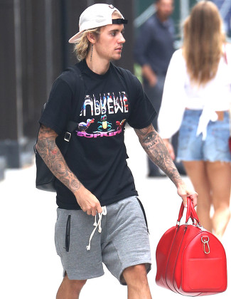 Justin Bieber Wears Louis Vuitton x Supreme Collection at British