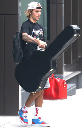 Justin Bieber Wears Louis Vuitton x Supreme Collection at British