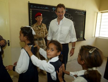 Prime Minister Tony Blair Meets Children At The Khadija Alkobra Girls School In The Southern Iraq Town Of Basra During His Visit. See Ross Benson Story.