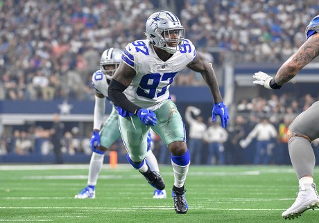 Dallas Cowboys defensive end Taco Charlton (97) walks off the