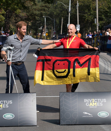 Prince Harry Present Thomas Stuber Of Germany With His Gold Medal For His Category Win In The Criterium Cycling Event Invictus Games 2017 At High Park Toronto Canada. Picture - Mark Large .... 26.09.17.