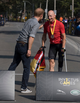 Prince Harry Present Thomas Stuber Of Germany With His Gold Medal For His Category Win In The Criterium Cycling Event Invictus Games 2017 At High Park Toronto Canada. Picture - Mark Large .... 26.09.17.