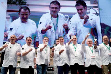 Spanish chef Juan Mari Arzak (2R), and some of his work mates and relevant Spanish chefs Carlos Arguiñano (L), Martin Berasategi (2L), Andoni Luis Aduriz (3L), Eneko Atxa (4L), Josean Allia (4R), Pedro Subijana (3L), and Hilario Arbelaitz (R), take part in Arzak's homage ceremony during the opening of Gastronomika's 20th edition in San Sebastian, Spain, 8 October 2018. The gastronomical congress takes place from 7 to 10 October 2018.